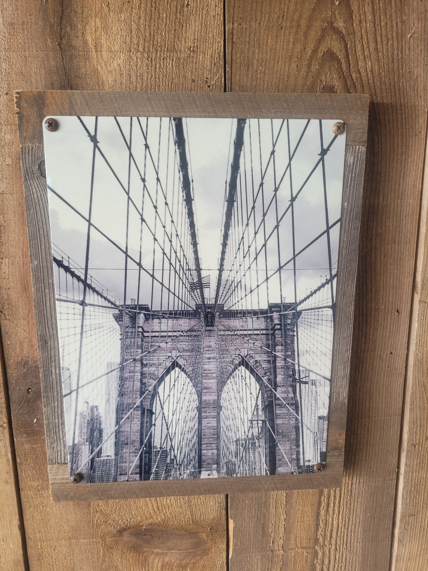 metal print on reclaimed wood