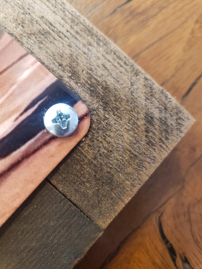 metal print on reclaimed wood